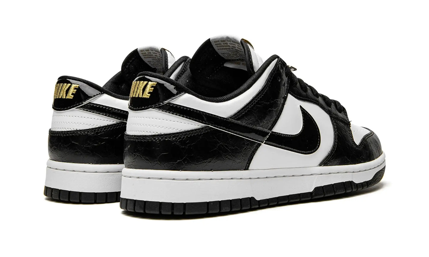 Tênis Nike Dunk Low Black "World Champ" Preto / Branco - DR9511-100
