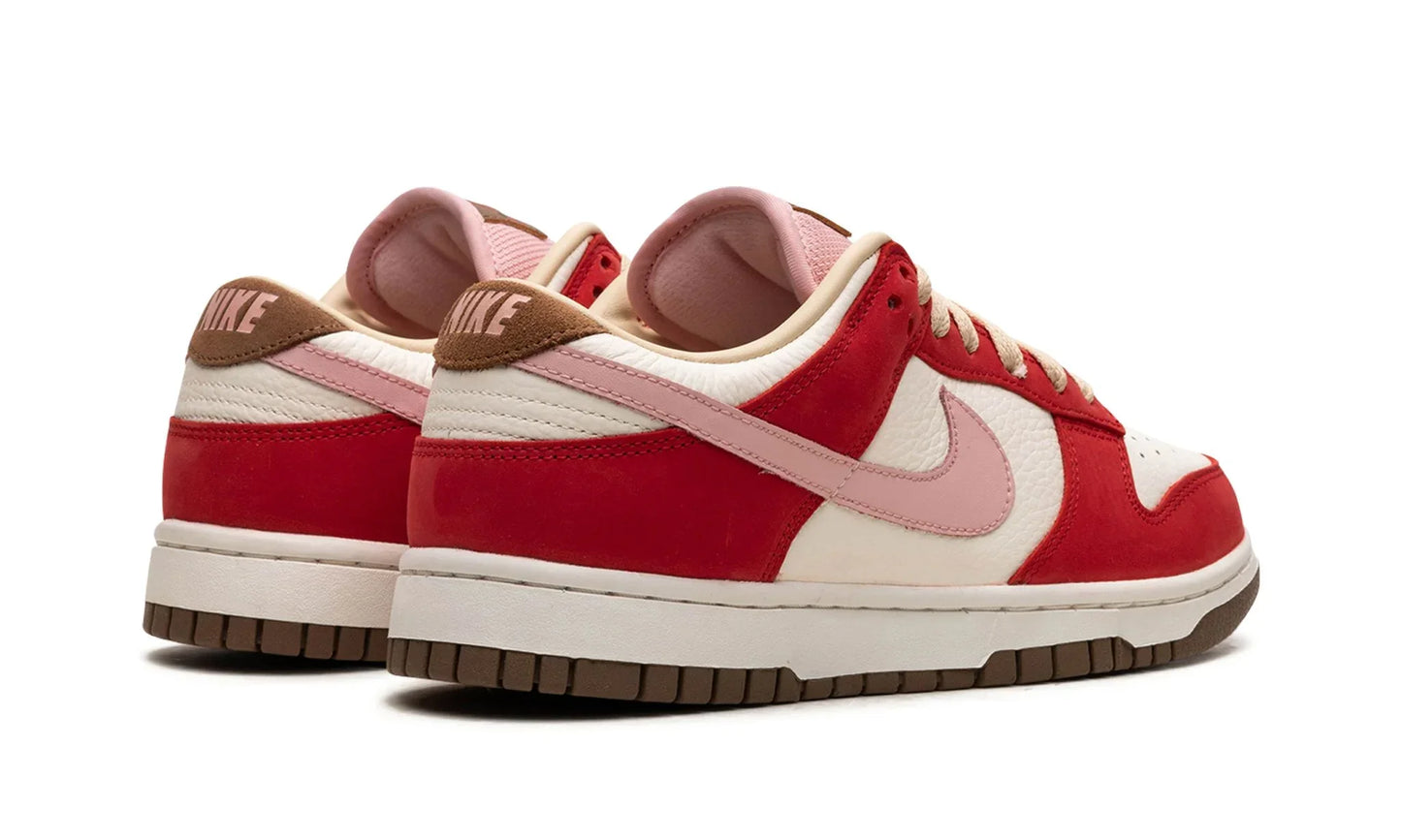 Tênis Nike Dunk Low Feminino "Bacon" Vermelho / Rosa - FB7910-600